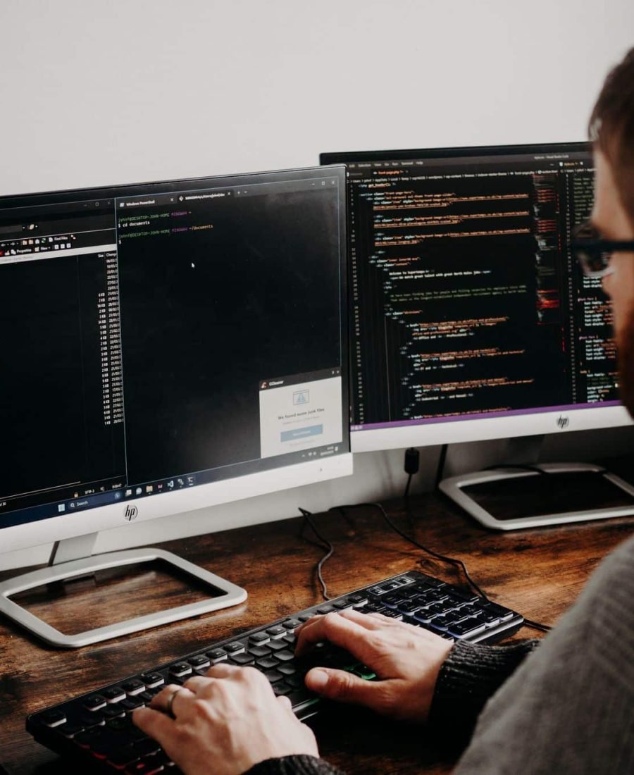 Store owner reviewing ecommerce website development figures